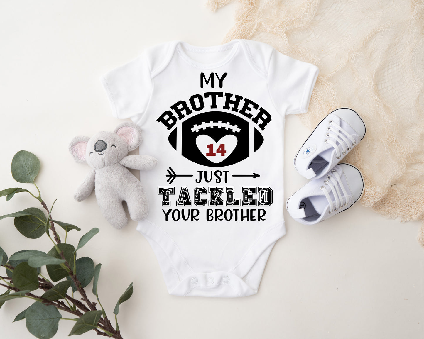 My Brother Tackled Your Brother Onesie®