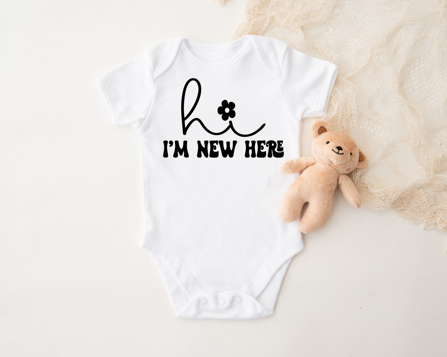 Hi I'm New Here Onesie®