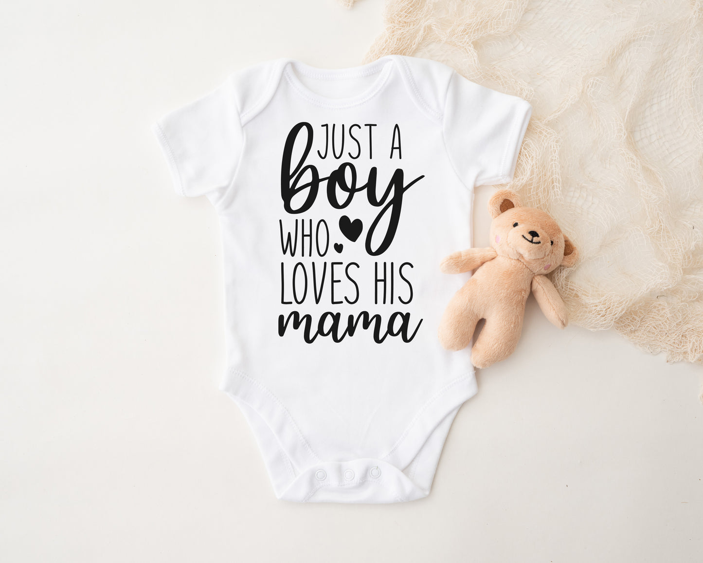 Just A Boy Who Loves His Mama Onesie®