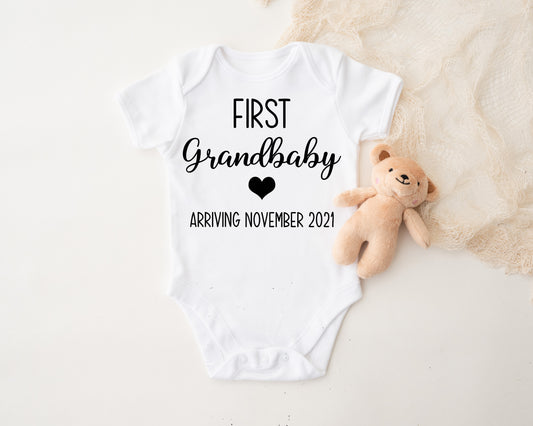 First Grandchild Arriving Onesie®